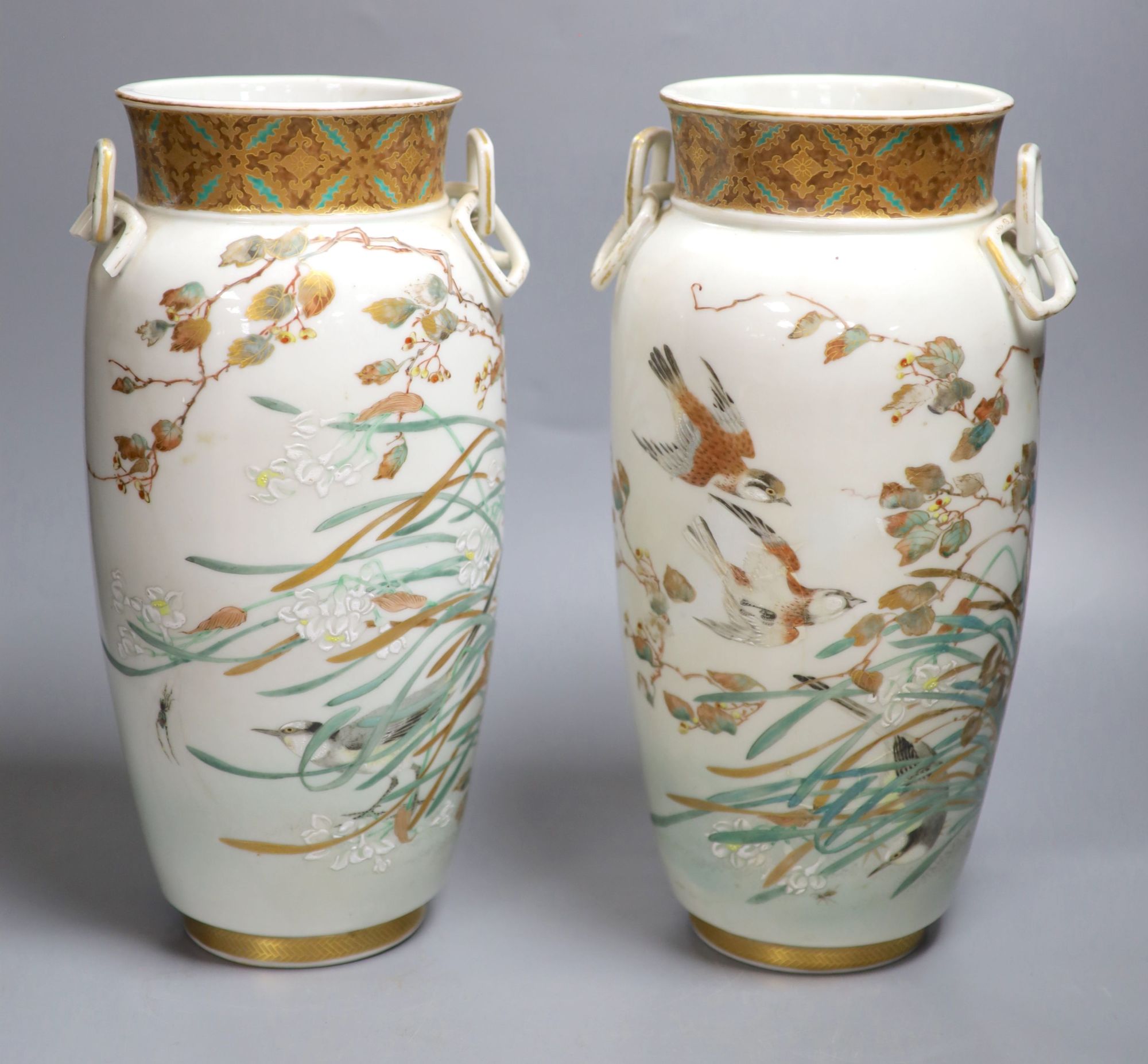 A pair of rare Japanese ceramic vases, signed Tokyo Houen, Meiji period, height 33cm